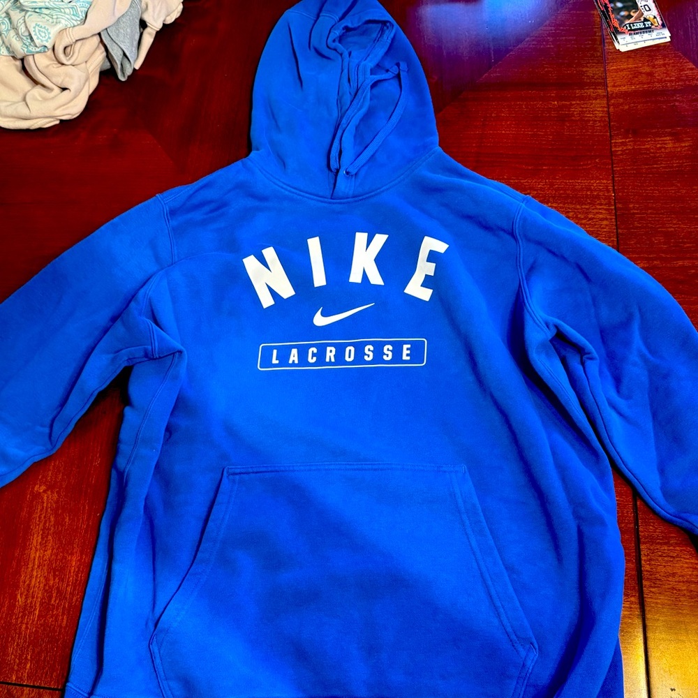 Nike Lacrosse Blue Hoodie 
Worn once 
Size: Latge 
Blue